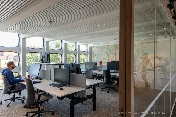 Sit-stand desks with ergonomic office chairs